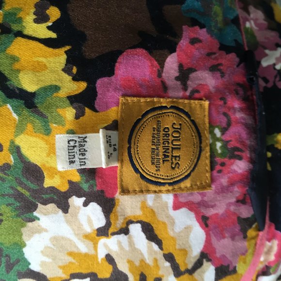 Navy and floral puffer vest. - Picture 5 of 5